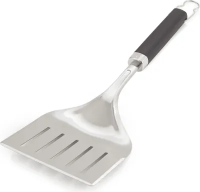A stainless steel fish spatula with a black handle, shown against a white background.