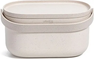 A close-up studio shot of a beige compost bin with a lid.