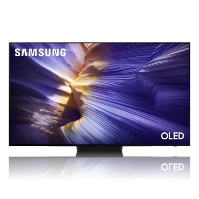 A Samsung OLED TV is displayed on a stand with a colorful abstract image on its screen.
