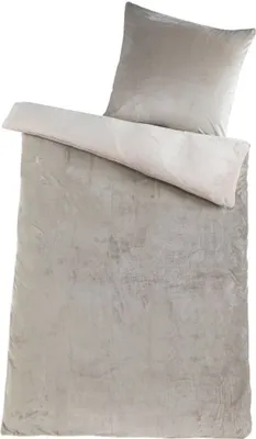 A folded duvet and pillowcase set, likely made of plush material, displayed on a white background.