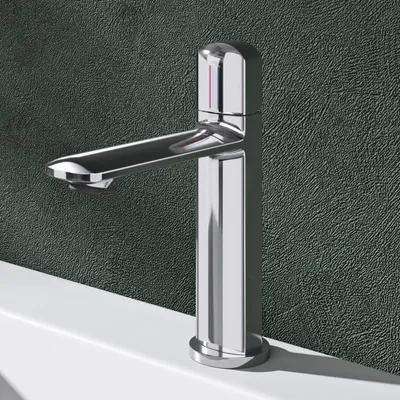 A close-up shot of a modern chrome faucet on a white sink against a textured dark gray background.