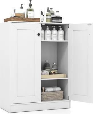A white bathroom cabinet with its doors open, displaying various toiletries and towels on its shelves.