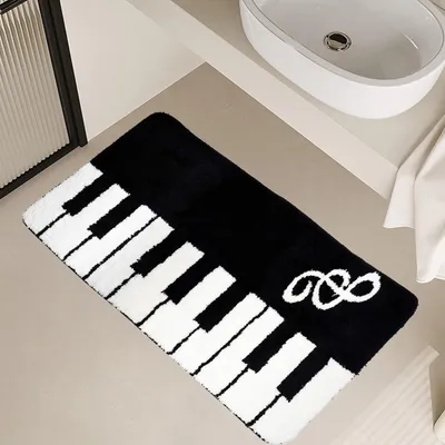 Obrázok produktu pre Rýchloschnúca podložka pod sprchu s motívom klavírnych kláves, 50 x 120 cm