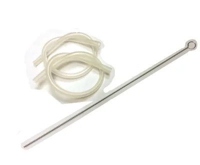 A set of clear tubing and a metal cleaning brush on a white background.