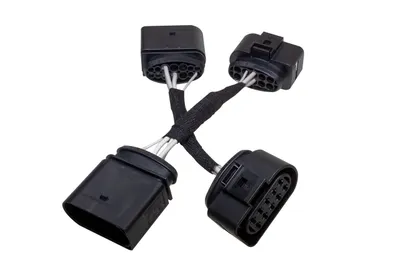 Zdjęcie produktu dla Oryginalny adapter Kufatec reflektorów XENON do HALOGEN dla VW Scirocco III 138