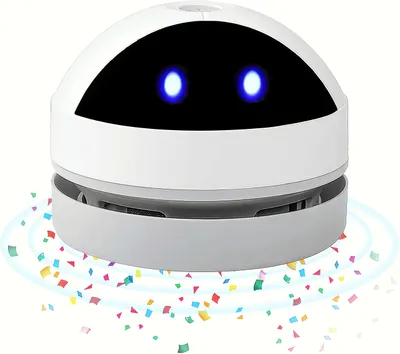A small, white, robot-like vacuum cleaner with blue glowing eyes is shown on a white background, with colorful confetti swirling around its base.