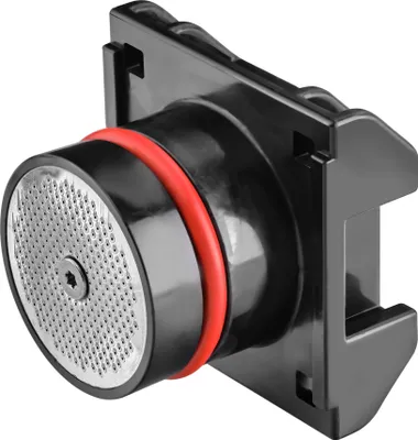 A close-up, angled view of a coffee machine brewing unit component.