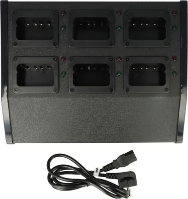 A black multi-bay battery charger with a power cord.
