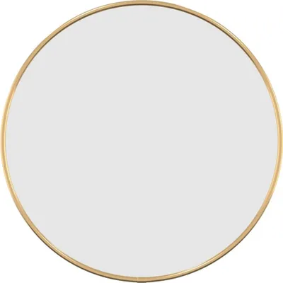 A round mirror with a gold frame.