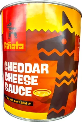 A can of Piñata Cheddar Cheese Sauce.