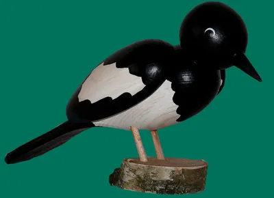 Produktbild von Ganzjahresdekoration Holzvogel Elster  Höhe 15cm NEU