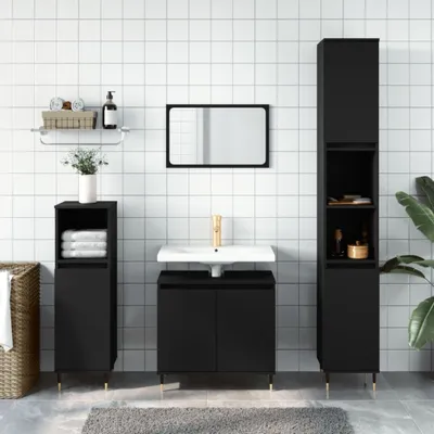 A modern black bathroom vanity set with a sink, mirror, and storage cabinets against a white tiled wall.