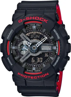 A close-up studio shot of a black and red Casio G-Shock watch against a white background.