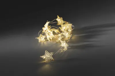 Produktbild von Konstsmide - LED Dekolichterkette, goldfarbene Metallsterne, 20 kalt weiße Dioden, batteriebetrieben, Innen, transparentes Kabel, 3 x AA 1.5V (exkl.); 3170-803