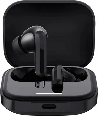 A pair of black wireless earbuds in their open charging case.