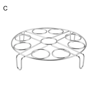 A silver metal egg rack with legs, designed to hold multiple eggs.