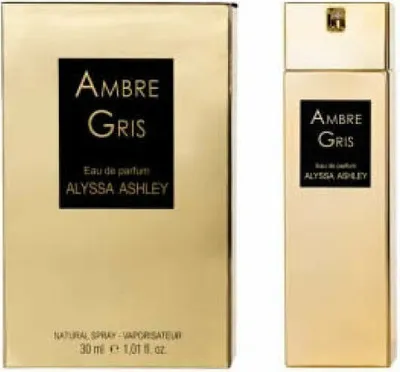 A gold-colored perfume box and bottle are displayed side-by-side against a white background.