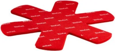 A red, star-shaped fabric protector with the Tefal logo repeated across its surface.