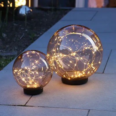 Produktbild von LED Solar Kugellampe - 2in1 - Kunststoff - warmweiße LED Drahtlichterkette - 2er Set - bernstein