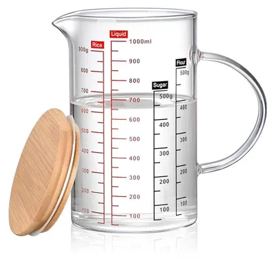 Immagine prodotto di Bicchiere graduato in vetro borosilicato, con manico e coperchio, dotato di beccuccio a forma di "V" per un versamento preciso