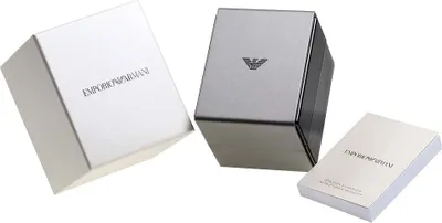 The image shows the packaging for an Emporio Armani watch, including the outer box, the inner watch case, and a booklet.