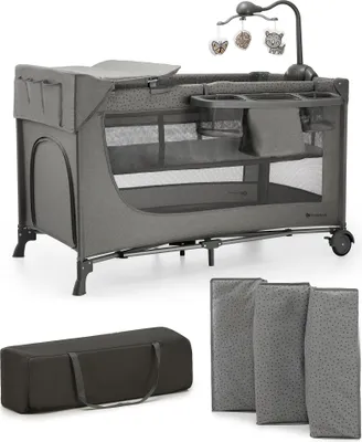 Produktbild von Kinderkraft JOY 2 3-in-1-Kinderbett mit Zubehör - Klappbar - Baby- und Reisebett - 2 Ebenen - Inklusive Mobile, Wickelauflage und Organizer - Grau