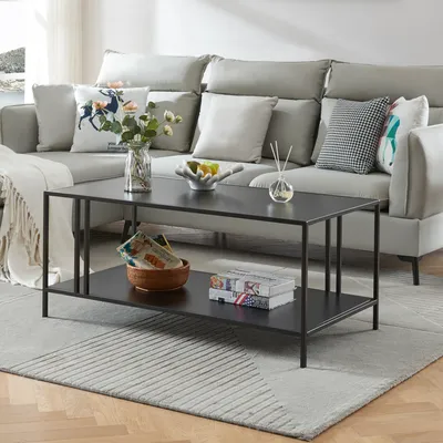 A modern living room scene with a couch and coffee table.