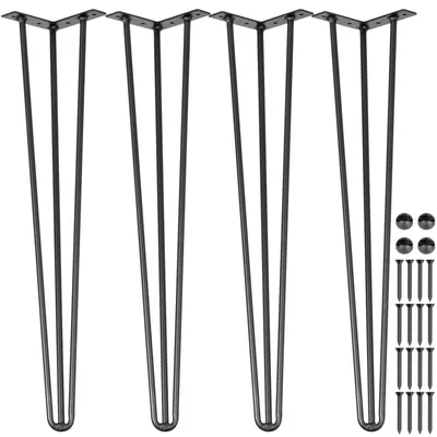 Four black hairpin table legs and a set of screws and caps are laid out on a white background.