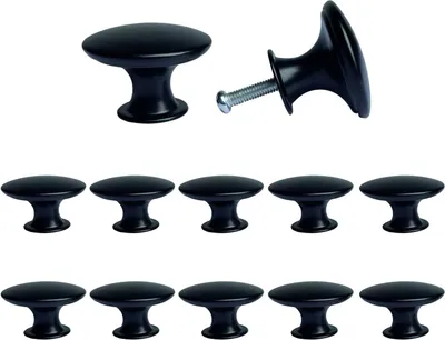 A collection of black cabinet knobs arranged on a white background.