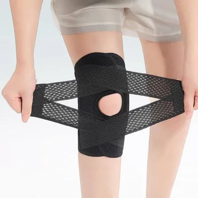 Produktbild von Knieband für Frauen und Männer, Knieband mit lateralen Stabilisatoren für Laufen, Sport, Kompression, Rotulettschutz, Arthrose, Schmerzen und Tendinitisverletzungsrehabilitation, geeignet für Kniebeschutz.