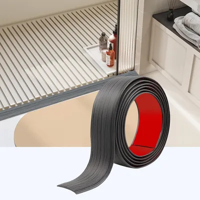 Imagen del producto de Perfil para puertas autoadhesivo, 200 cm x 4 cm, PVC, gris oscuro, para zócalos