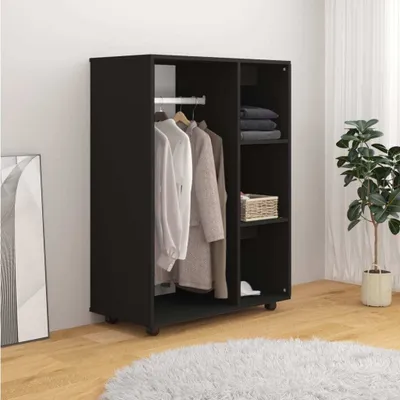 A black wardrobe with clothes hanging inside and shelves with folded clothes and a basket.