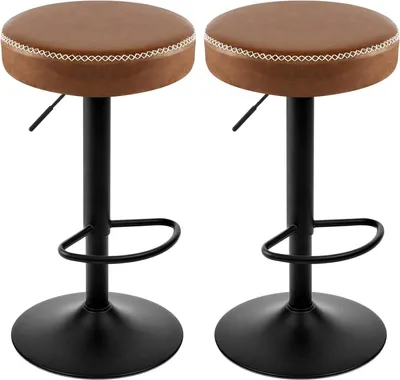 Two brown bar stools with black bases and adjustable height.