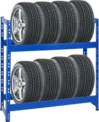 A blue metal rack holding two rows of car tires against a white background.