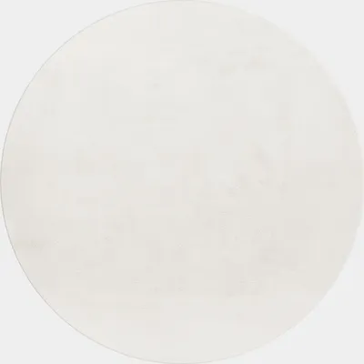 A plain white circular rug is shown against a light gray background.
