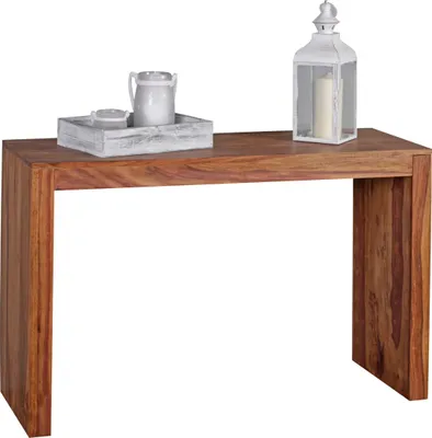 A wooden console table with decorative items on top, set against a white background.