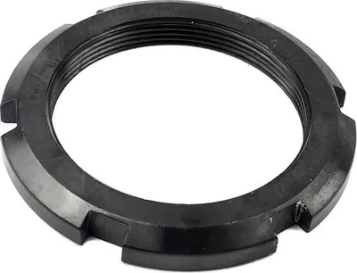 A black metal nut with internal threads is shown against a white background.