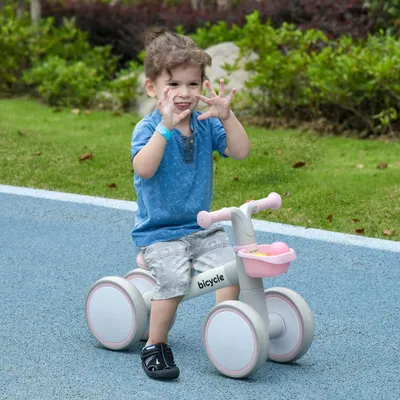 Imagen del producto de Sweiko: Bicicleta de equilibrio, triciclo, asiento ajustable, ruedas silenciosas, 56x27x39 cm, rosa/blanco