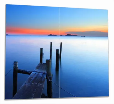 Produktbild von Wallario Herdabdeckplatte aus Glas, Größe 60 x 52 cm 2-teilig, Motiv Steg im Wasser - Abendstimmung am Meer