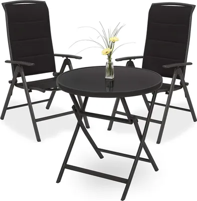 A black folding garden table and two chairs set on a white background.