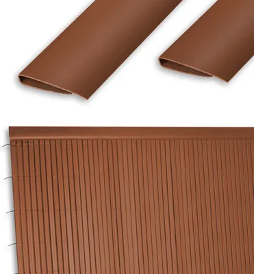 Two pieces of brown plastic trim and a section of brown plastic fencing.