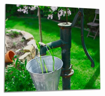 Produktbild von Wallario Herdabdeckplatte aus Glas, Größe 60 x 52 cm 1-teilig, Motiv Wasserquelle im Garten