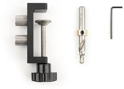 Imagen del producto de Soporte de aluminio para perforaciones de perfiles: juego 5 en 1 con taladro de impacto M6, que incluye un soporte de aluminio para perforar