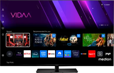A smart TV screen displaying various streaming service apps and content.
