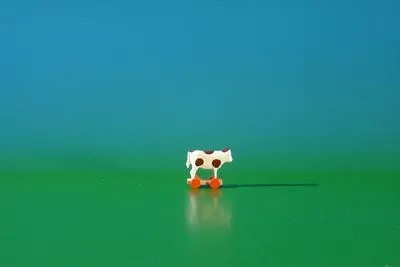 Produktbild von Holzfigur Reifentier Kuh Höhe 2,5cm