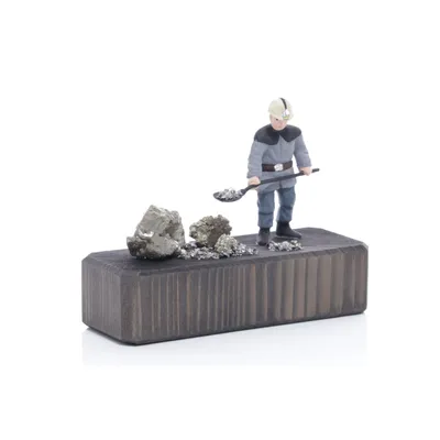 Produktbild von Miniaturbergwerk Sockel Wismut-Kumpel mit Bohrhammer mit Edelstein bunt BxHxT 9x12x4,5cm NEU