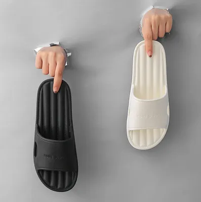 Produktbild von INF Bequeme schwarze EVA-Slipper - Perfekt für drinnen und draußen Weiß 35-36