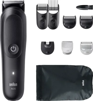 A collection of grooming tools and accessories, including a beard trimmer, various attachments, and a storage pouch, displayed against a white background.