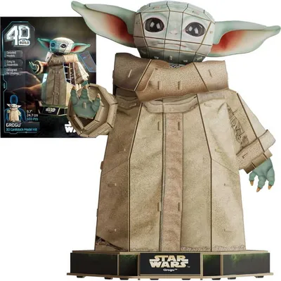 A 3D cardboard model of Grogu from Star Wars, with its packaging in the background.
