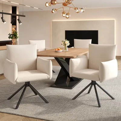 A dining room setting with a wooden table and chairs.